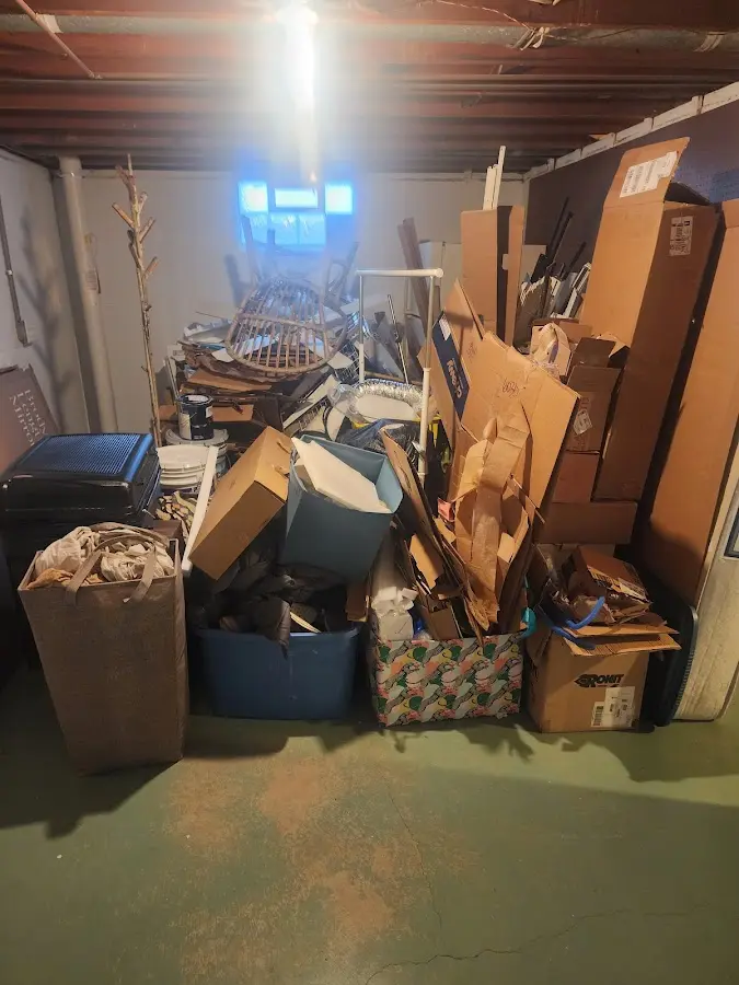 Roll-off dumpster container at job site for 40 Yard Dumpster Rental in Fenton